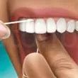 روش-صحیح-نخ-دندان-کشیدن